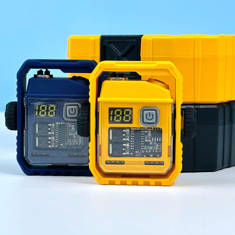 فندک پلاسمایی چرغ قوه و اسپینر دار مدل D68 در دو رنگ آبی و زرد در کنار هم و جعبه های مخصوص آنها