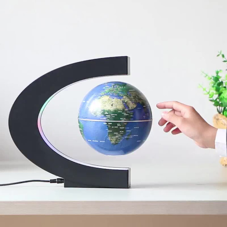 دکوری کره زمین مغناطیسی معلق مدل C روی میز اتاق